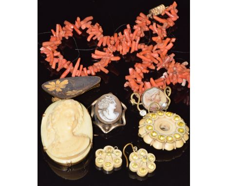Victorian brooch set with an ivory cameo of a young woman, Victorian ivory brooch set with paste and matching earrings, coral