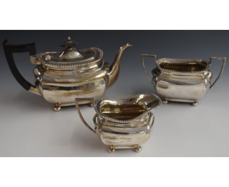 George V Walker &amp; Hall hallmarked silver three piece teaset, raised on four ball feet, Birmingham 1915, length of teapot 