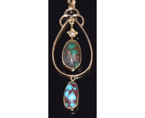 A 9ct gold pendant set with two boulder turquoise cabochons, 2.4g