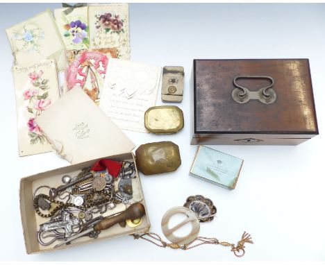 A collection of jewellery and bijouterie including mourning brooch, snuff boxes, pocket watch chains, early 20thC greetings c