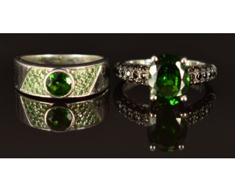 Two 9k white gold rings, one set with diopside and black spinel (size M, 4.8g) and the other diopside, size L/M, 4.3g