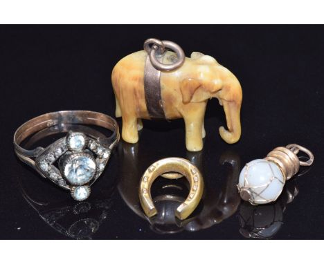 Victorian 9ct gold ring set with paste (2.2g), ivory elephant charm, a 9ct gold charm, yellow metal Victorian horseshoe charm