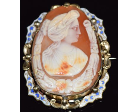 Victorian pinchbeck brooch set with a cameo within an enamel border, 5 x 6.6cm