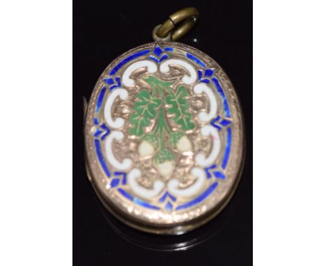 Victorian pinchbeck locket depicting acorns set with enamel and scrolling decoration, 3.2 x 2.6cm