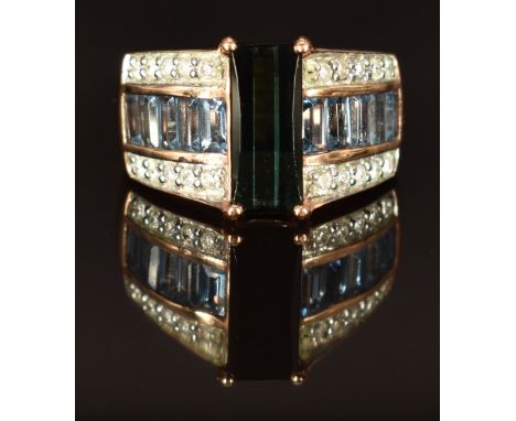 An 18k rose gold ring set with tourmaline, aquamarines and diamonds, size L/M, 10.5g&nbsp;