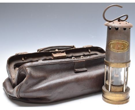 Thomas and Williams, Aberdare miner's lamp and a vintage leather Gladstone bag, L45cm