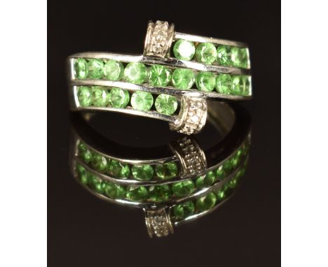 A 9k white gold ring set with tsavorite garnets and zircon, size L/M, 3.6g&nbsp;