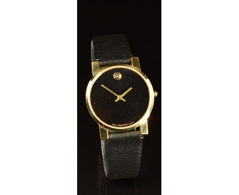 Movado Museum gentleman's wristwatch ref. 84.G4.875 with gold hands, black dial, gold plated case and quartz movement, on bla