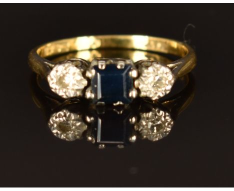 An 18ct gold ring set with a square cut sapphire and diamonds in platinum setting, 2.4g,&nbsp;size K&nbsp;