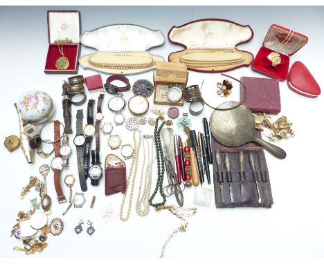 A collection of costume jewellery including silver napkin rings, silver handled manicure set, Timex watches, necklaces, vinta