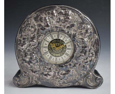 Hallmarked silver mounted Precista mantel or dressing table clock, with embossed decoration of cherubs amongst vines and with