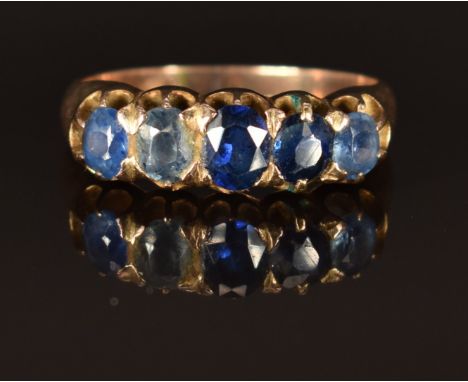 A c1900 9ct gold ring set with five sapphires, size J/K, 3.1g&nbsp;