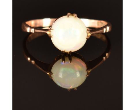 A 9ct rose gold ring set with an opal cabochon, size K, 1.4g&nbsp;