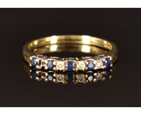 A 9ct gold ring set with diamonds and sapphires, size M, 1.5g&nbsp;