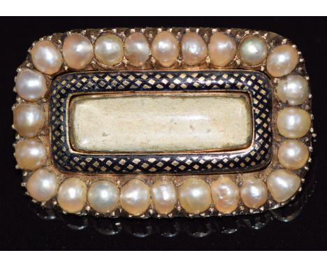 Victorian mourning brooch set with split pearls and enamel, with glass compartment to the centre&nbsp;