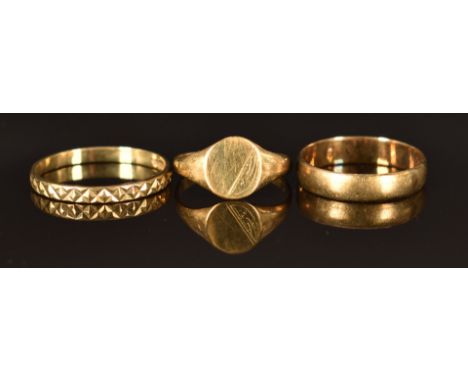 A 9ct gold signet ring (size H, 0.8g) and two 9ct gold rings (one set with diamonds), sizes K and N/O, 2.3g&nbsp;