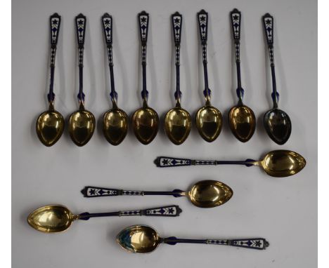 Set of 12 hallmarked silver and blue and white enamel spoons, seven of the spoons having import marks for London 1881, maker&