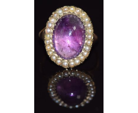 Victorian ring set with a foiled amethyst cabochon surrounded by seed pearls, size M/N, 6g&nbsp;