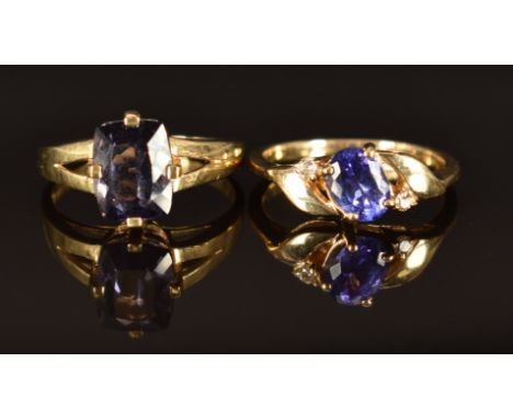 A 14k gold ring set with tanzanite and diamonds (size L/M, 2.9g) and a 9ct gold ring set with quartz, size M, 2.4g