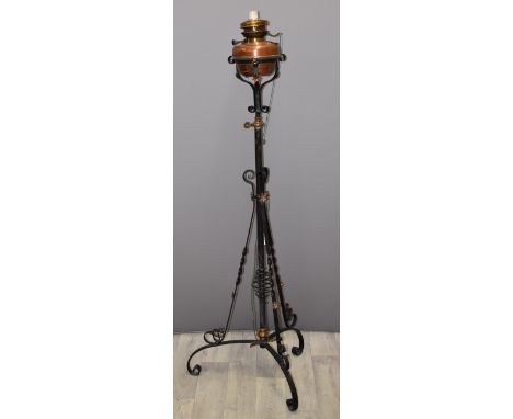 In the manner of WAS Benson Victorian wrought iron and copper extending oil lamp, H152cm