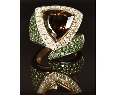 A 9k gold ring set with smoky quartz, tsavorite garnets and diamonds, size M, 11g&nbsp;