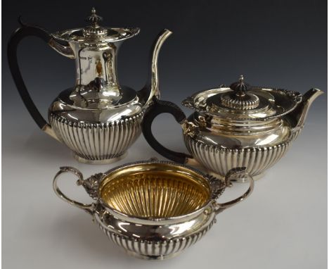 Walker &amp; Hall George V hallmarked silver three piece tea set with reeded lower bodies, Sheffield 1912, length of teapot 2