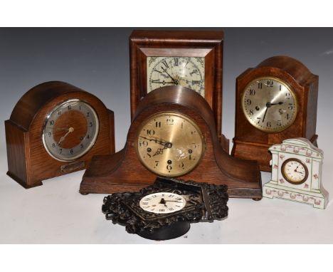 Six various clocks to include an 8 day American shelf clock with Cheltenham retailer, Wurttemberg mantel two train, three tra