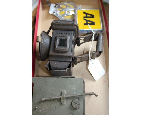 J. Miller &amp; Co "Lumo" bicycle light, two AA badges, Second World War traffic signalling lantern (4)