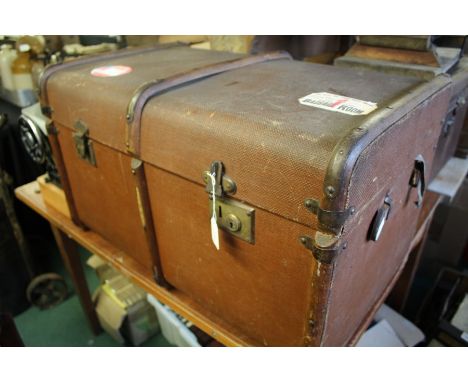 Canvas and wood bound cabin trunk, 76cm wide, containing seven Old Spice wooden boxes (8)