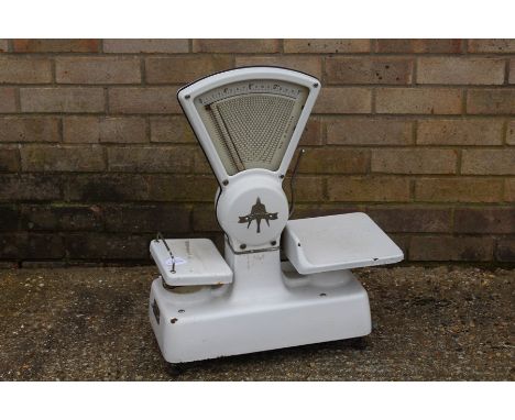 Swift white enamelled shop counter balance scales, 52cm wide, 65cm high
