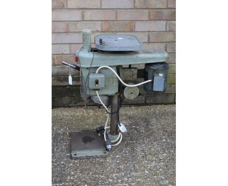 Russell pillar drill with attached light