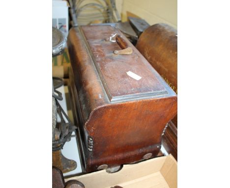 Jones manual sewing machine, housed in a case with canted corners