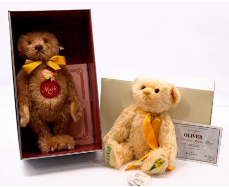 Steiff teddy bear pair including: (1) Music Teddy replica 1951, white tag 408458, LE 7000, mohair, red felt disc to chest wit