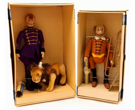 Steiff felt doll pair including: (1) Lion Tamer felt doll with mohair Lion, white tag 412073, LE 12000, lion has chest tag, c