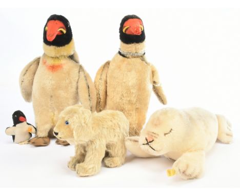 Steiff collection of three vintage penguins, a seal cub and a polar bear: (1) &amp; (2) Steiff Peggy penguin pair, Art No 433