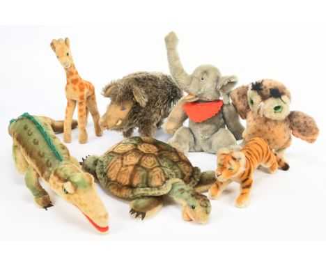 Collection of seven vintage animals, including: Steiff Slo turtle, missing button, 15"/38cm long; Steiff tiger cub, with butt