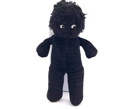 Merrythought Dixie doll, black velveteen, large white side glancing inset glass eyes with black pupil, black astrakhan hair, 