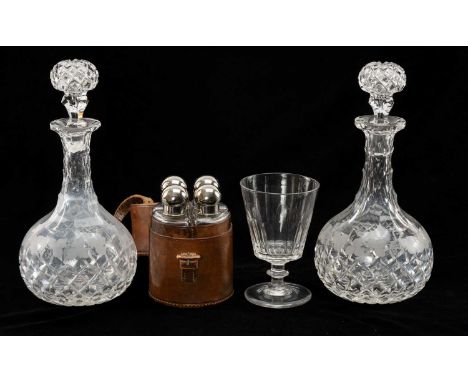ASSORTED ANTIQUE GLASSWARE, comprising fruiting vine engraved globe and shaft decanters and stoppers, slice cut rummer, leath