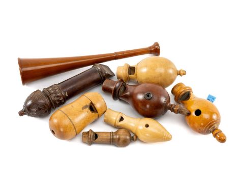 ASSORTED TREEN BIRD CALLS, boxwood and fruitwood, together with turned yew wood hunting horn, horn 24cms (8)Provenance: the K