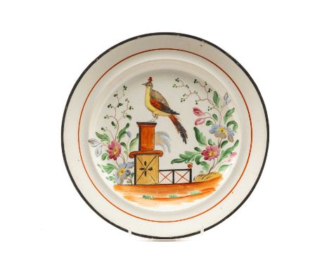 SWANSEA POTTERY PLATE, 1830-50, painted with an exotic bird perched on a pedestal between stylised plants and flowers, impres