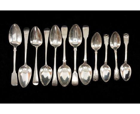 GROUP OF ASSORTED SILVER SPOONS comprising four fiddle and shell spoons with engraved crest, eight similar tablespoons, 21ozt