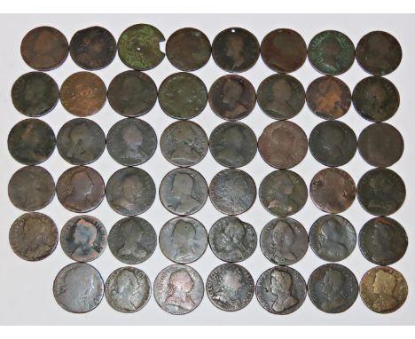 A collection of Evasion / Forgery Georgian halfpennies together with other regal issues and an American cent, with an old tic