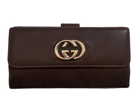 Gucci  wallet purse in leather and suede with gold monogrammed hardware to front. Used. 19x11cm 