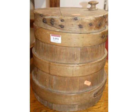 A planked table top barrel and cover, with sundry contents