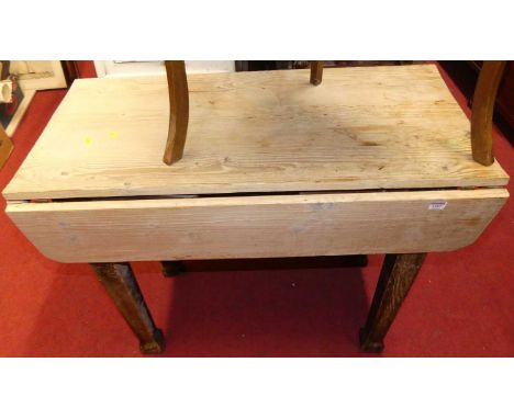 A rustic pine dropflap kitchen table, length 97cm 