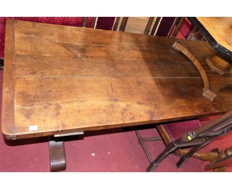 A 19th century plank topped round cornered oak refectory dining table, having cleated ends, length 191cm