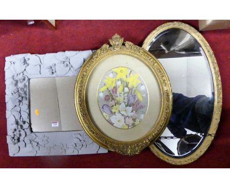 A gilt composition framed and bevelled oval wall mirror, painted ceramic wall mirror, and a botanical print (3)