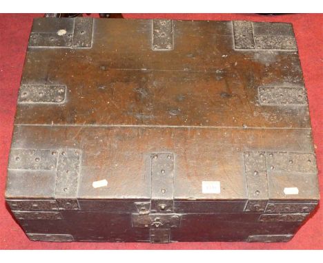 A 19th century stained oak and iron bound slightly domed hinge topped table chest, having end carry handles, w.56cm 