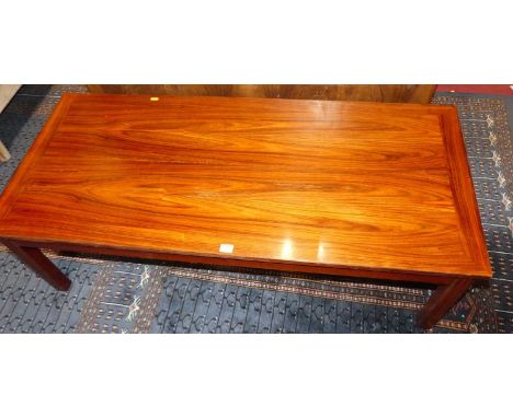 A 1970s hardwood rectangular low coffee table, length 130cm 