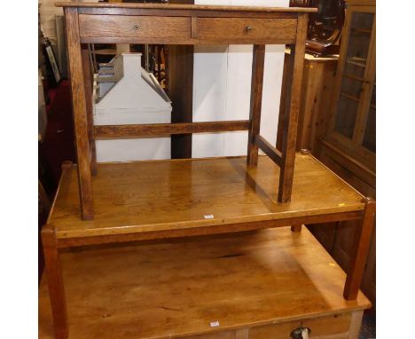 An early 20th century oak two drawer side table, w.81cm; together with an oak coffee table, length 122cm (2)